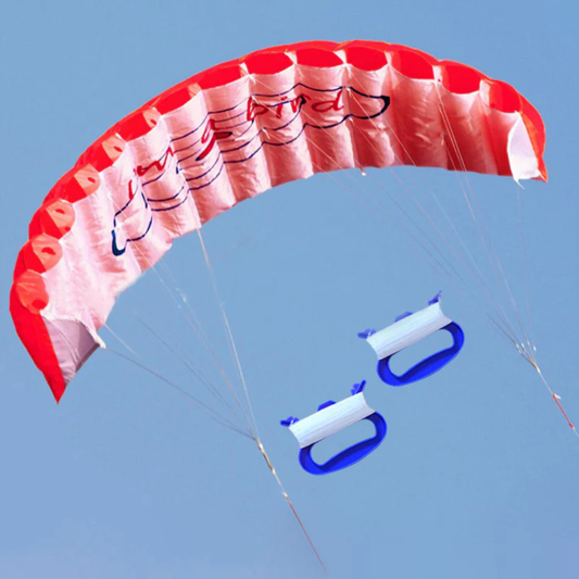 Wikz Parafoil drage i rød med styrehåndtag, vist på blå baggrund